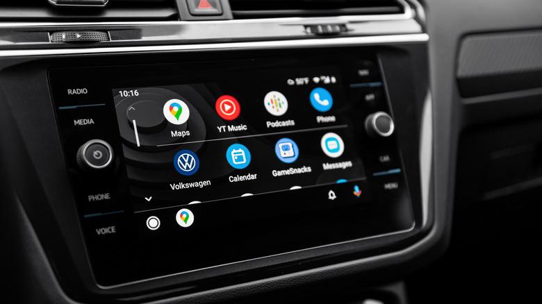 A close-up shot of Android auto main screen menu in a modern car.