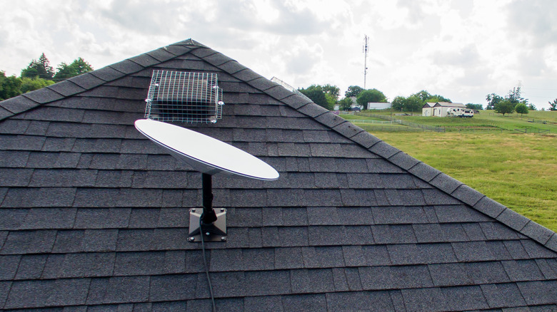 Starlink satellite on house roof