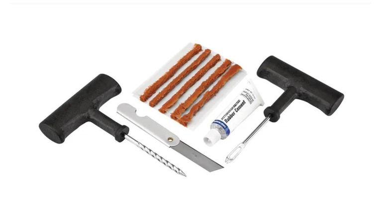 tire repair kit on white background