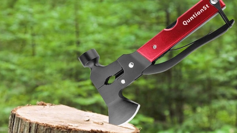 multi tool on tree trunk