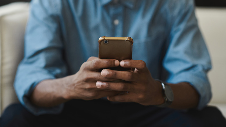 Man holding smartphone