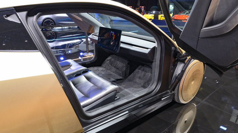 Tesla Cybercab or Robotaxi two-passenger battery-electric self-driving car interior on display at the AutoSalon