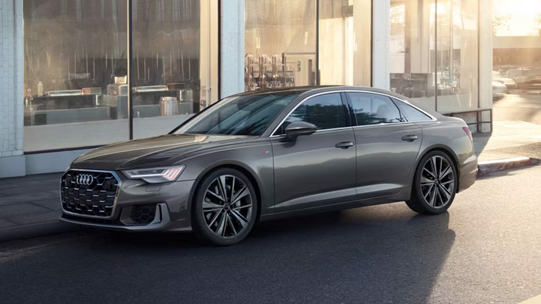An Audi A6 parked on a city street
