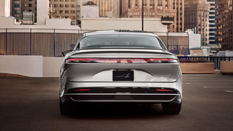 A Lucid Air parked in a city parking lot
