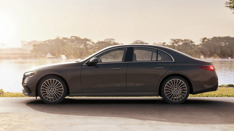 A Mercedes Benz E-Class sedan parked near a lake