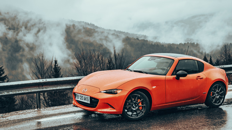 Mazda MX-5 Miata on a mountain road in winter