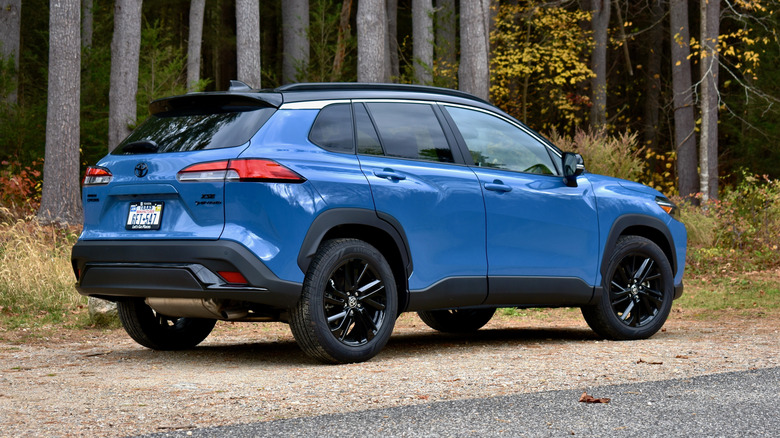 2026 Toyota Corolla Cross Hybrid rear three quarter view.