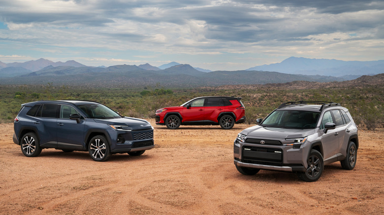 2026 Toyota RAV4 Limited, GR Sport, and Woodland parked in a desert