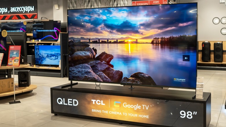 A large QLED TV on display in a store