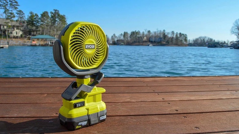 Ryobi clamp fan sitting on deck by the water