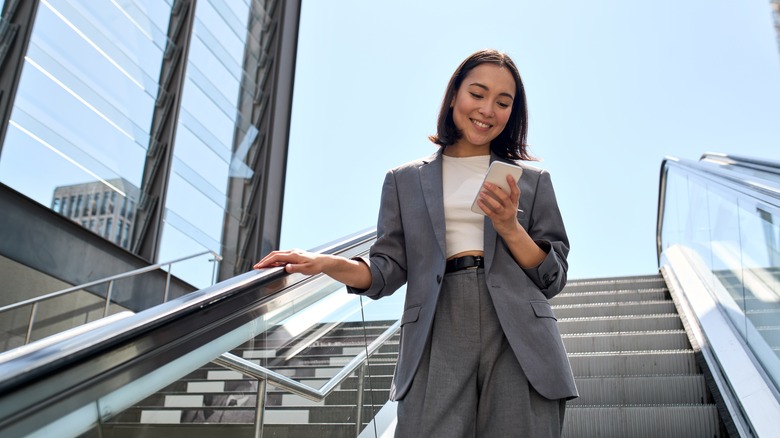 woman using her phone