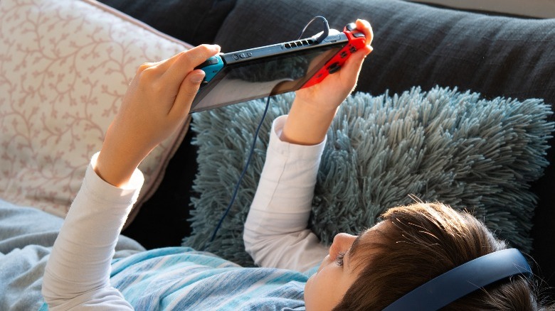 Kid playing on a switch
