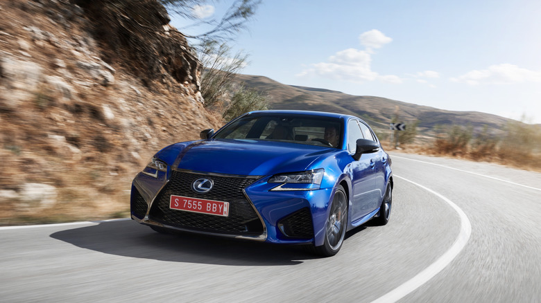 Lexus GS F cornering at speed front 3/4 view