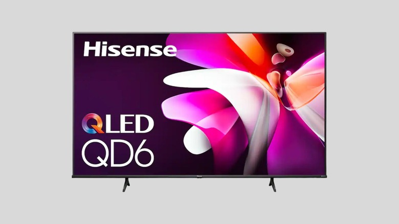 Hisense 75QD65NF tv on a gray background