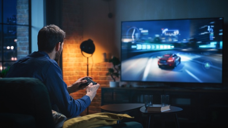 man playing racing game