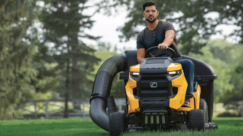 Person using Cub Cadet riding mower