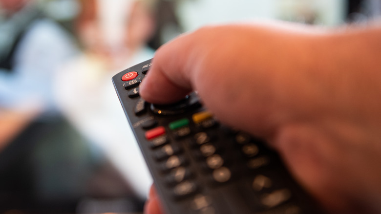 TV remote control hand