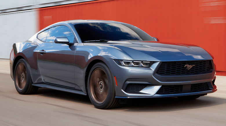 Silver 2025 Ford Mustang on the road
