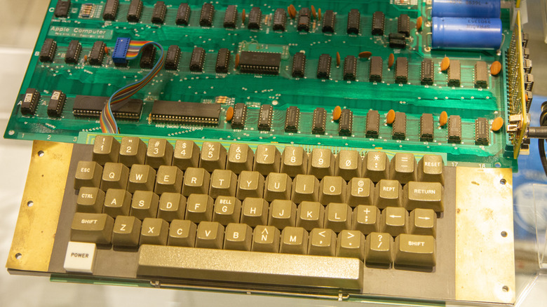 Apple I computer with monitor, keyboard, and motherboard