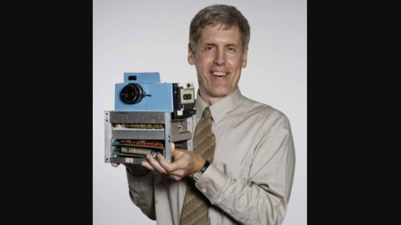 Steve Sasson holding the first digital camera