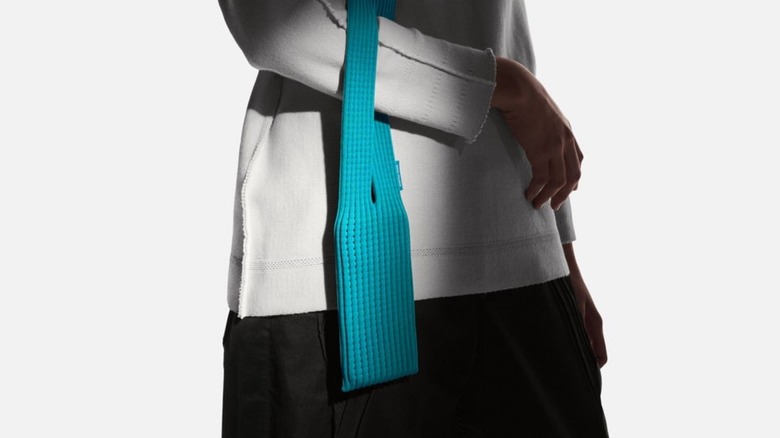 iPhone pocket in blue worn over someone's arm