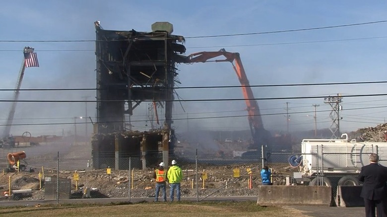 Final section of K-25 Oak Ridge plant being torn down by crane