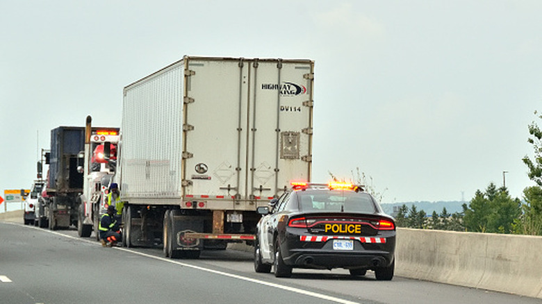 Semis pulled over on the highway by the police