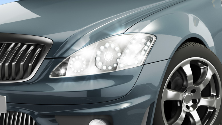 A car with white LED headlights.