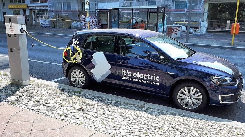 VW e-Golf plugged into a street-side EV Charging station