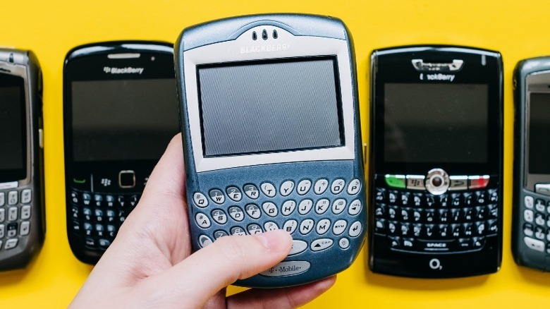 hand holding BlackBerry 7230