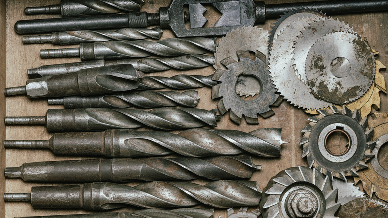 Old drills and saws next to each other