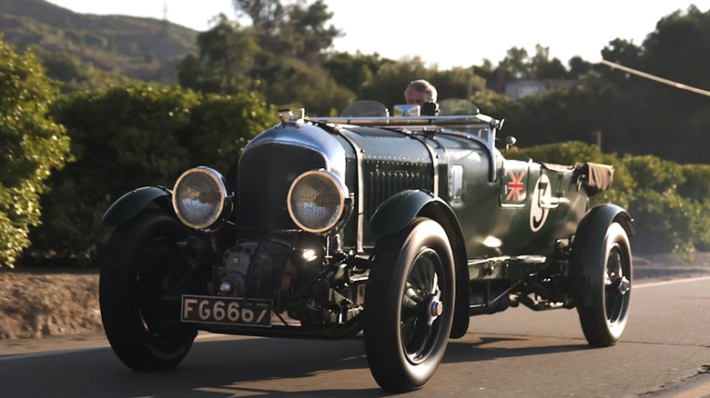 Person driving '31 Bentley Blower