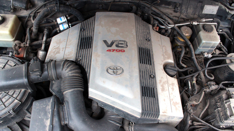 A view of a dirty Toyota V8 engine