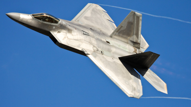 f-22 raptor fighter in flight from above