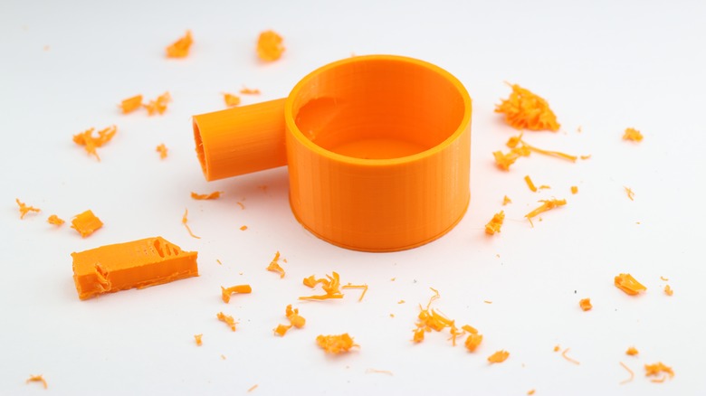 3D print surrounded by debris