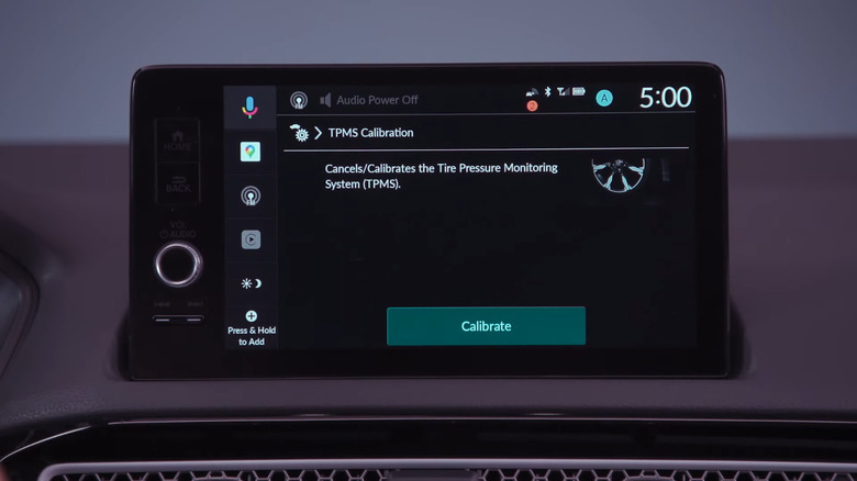 Honda Civic touch screen showing TPMS calibration button