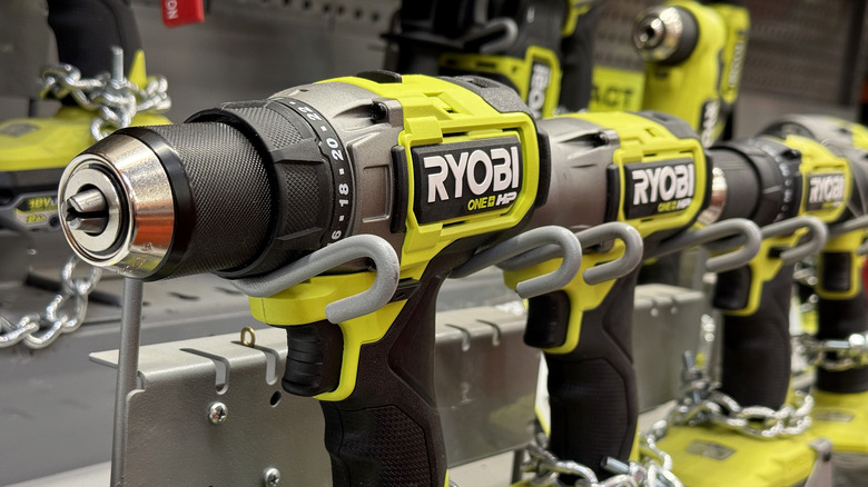 Ryobi drills on shelf