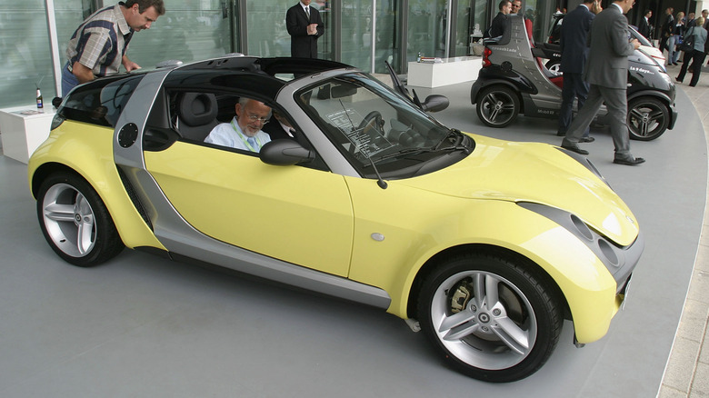 Yellow Smart Roadster on display at 2003 Frankfurt Motor Show