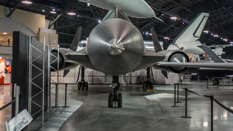 Front view of SR-71 airplane on display in a museum.