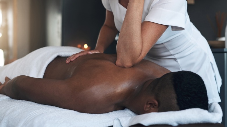 Man getting a back rub