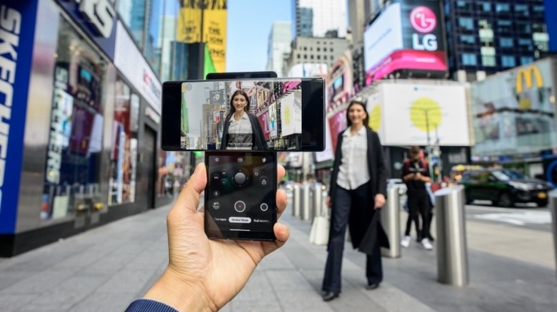 lg wing smartphone swivel picture woman