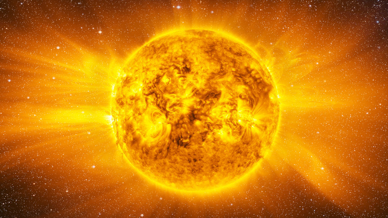 A depiction of the sun surrounded by stars