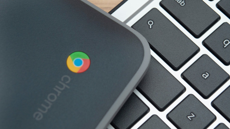 Chromebook placed above a laptop