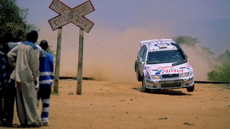 kenya safari rally fans railroad crossing sign