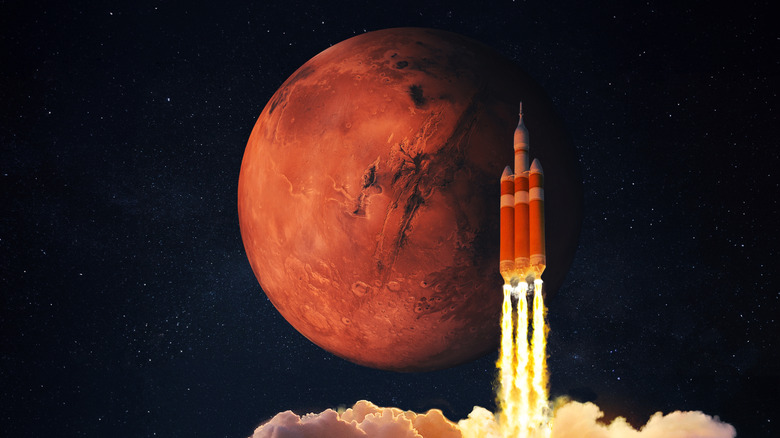 An artist's depiction of a rocket against the backdrop of Mars.