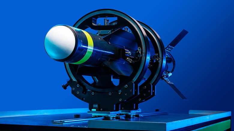 Raytheon Coyote  drone on display table in launcher