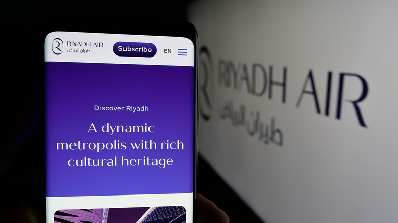 Riyadh Air website with logo in background