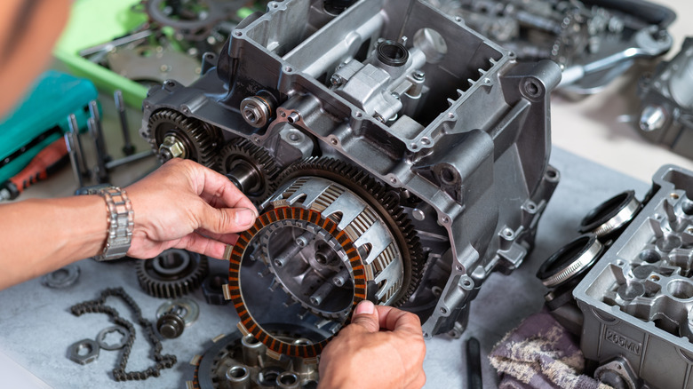 Maintenance being done an automotive clutch