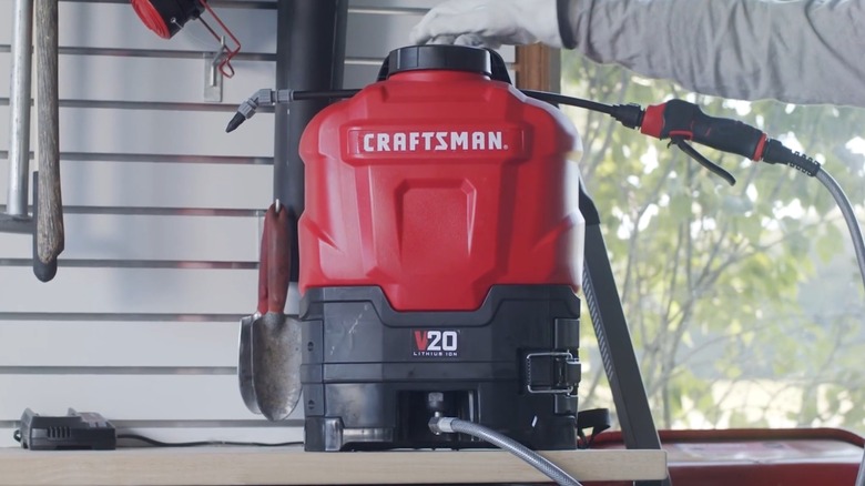 A Craftsman backpack sprayer on a table.