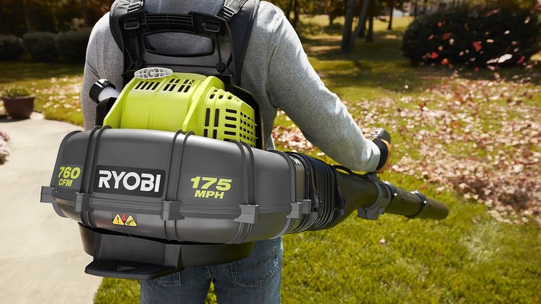 Ryobi 2-Cycle 760-cfm Backpack Blower in use